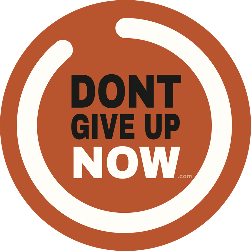 Don't Give Up Now — classic circle sticker (orange)